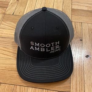 Gray and black snap back trucker hat - Smooth Ambler brand logo